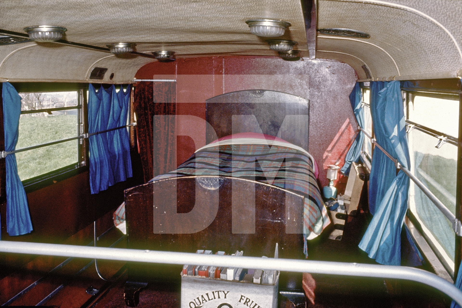 Free Photographic Omnibus, interior upstairs looking towards the rear. Birmingham, March 1974 by Daniel Meadows