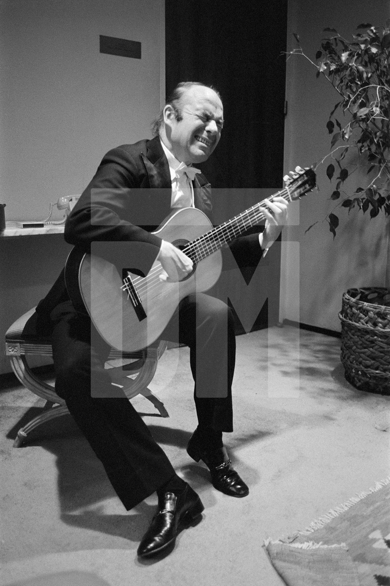 Julian Bream in dressing room, Lincoln Centre, New York. November 1981 by Daniel Meadows