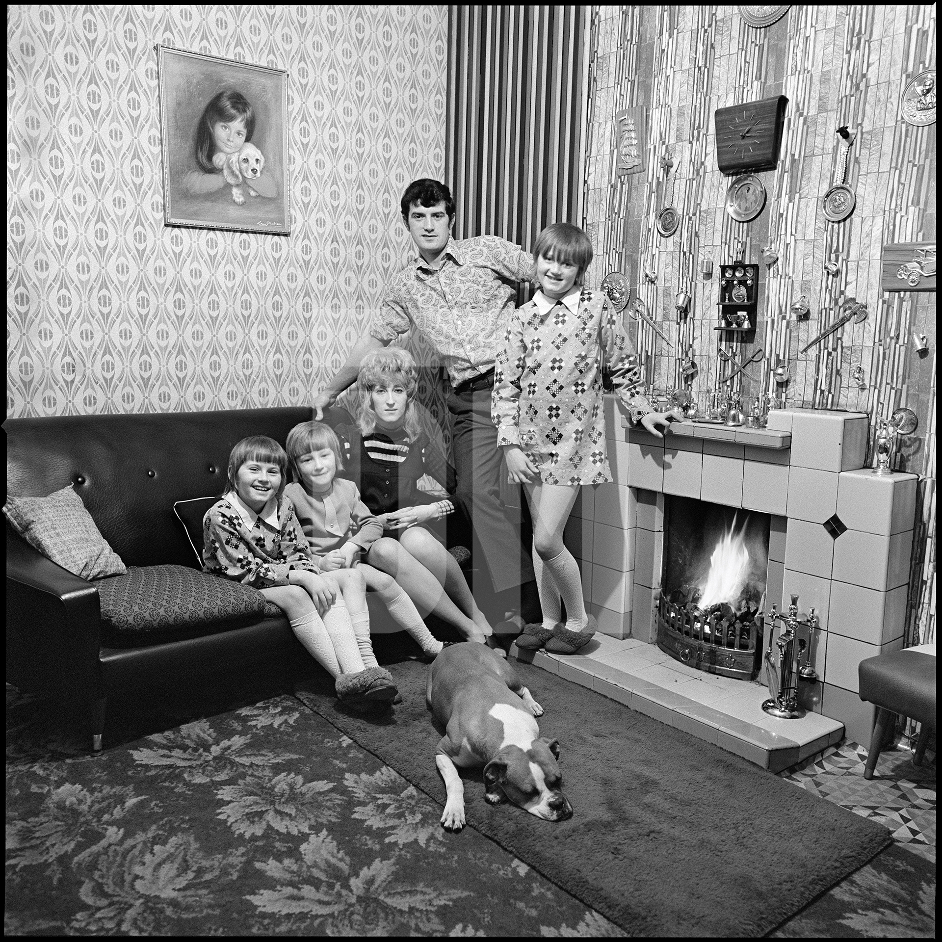 Jacqueline, Barbara, Joan, Alan and Kim. The Craddock family, residents of June Street, Salford. 1973 by Daniel Meadows