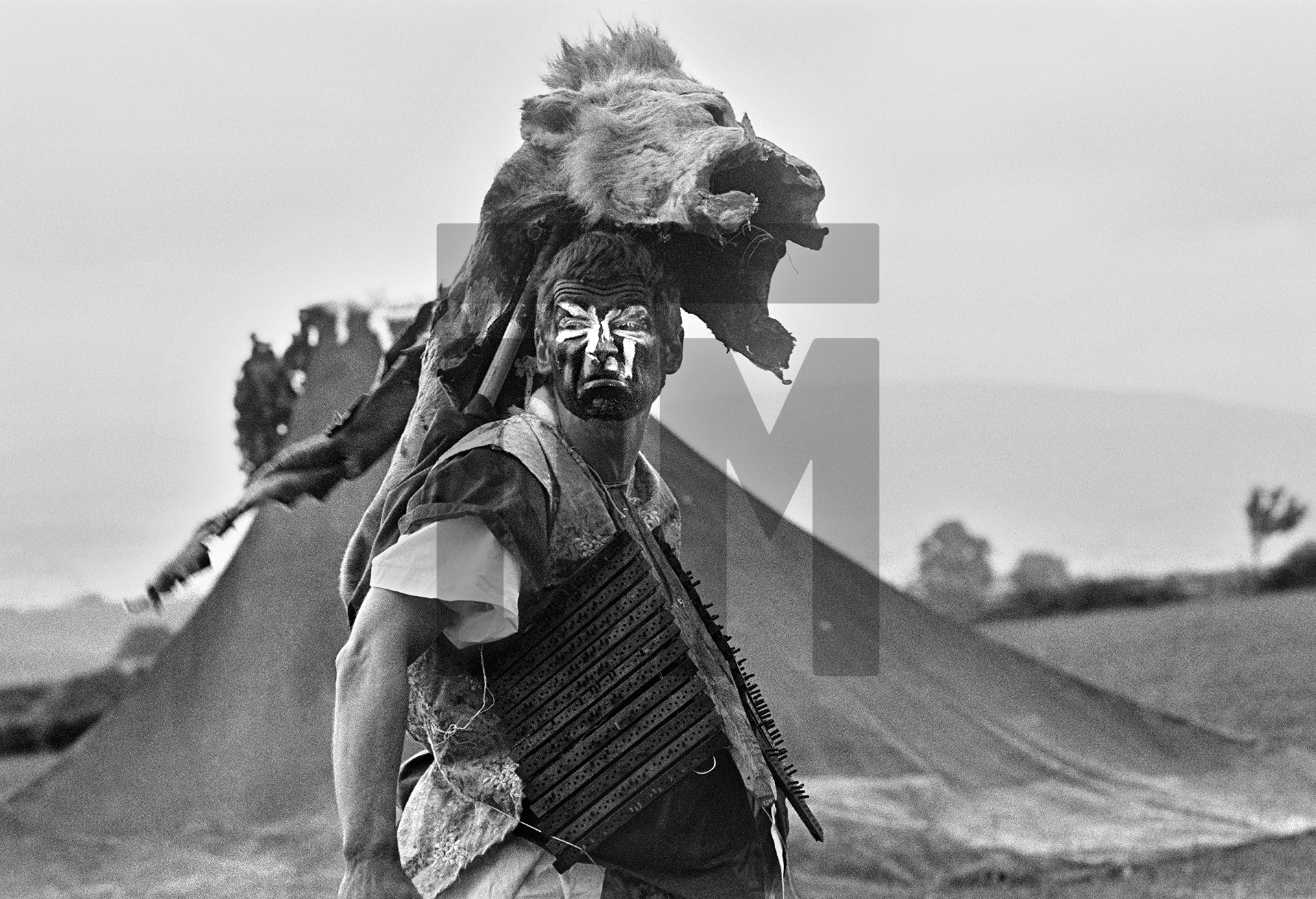 Performer Jamie Proud as Lord Claude in “Uppendown Mooney” written by Adrian Mitchell. Hilltop Farm, Wennington, Lancashire. July 1978 by Daniel Meadows