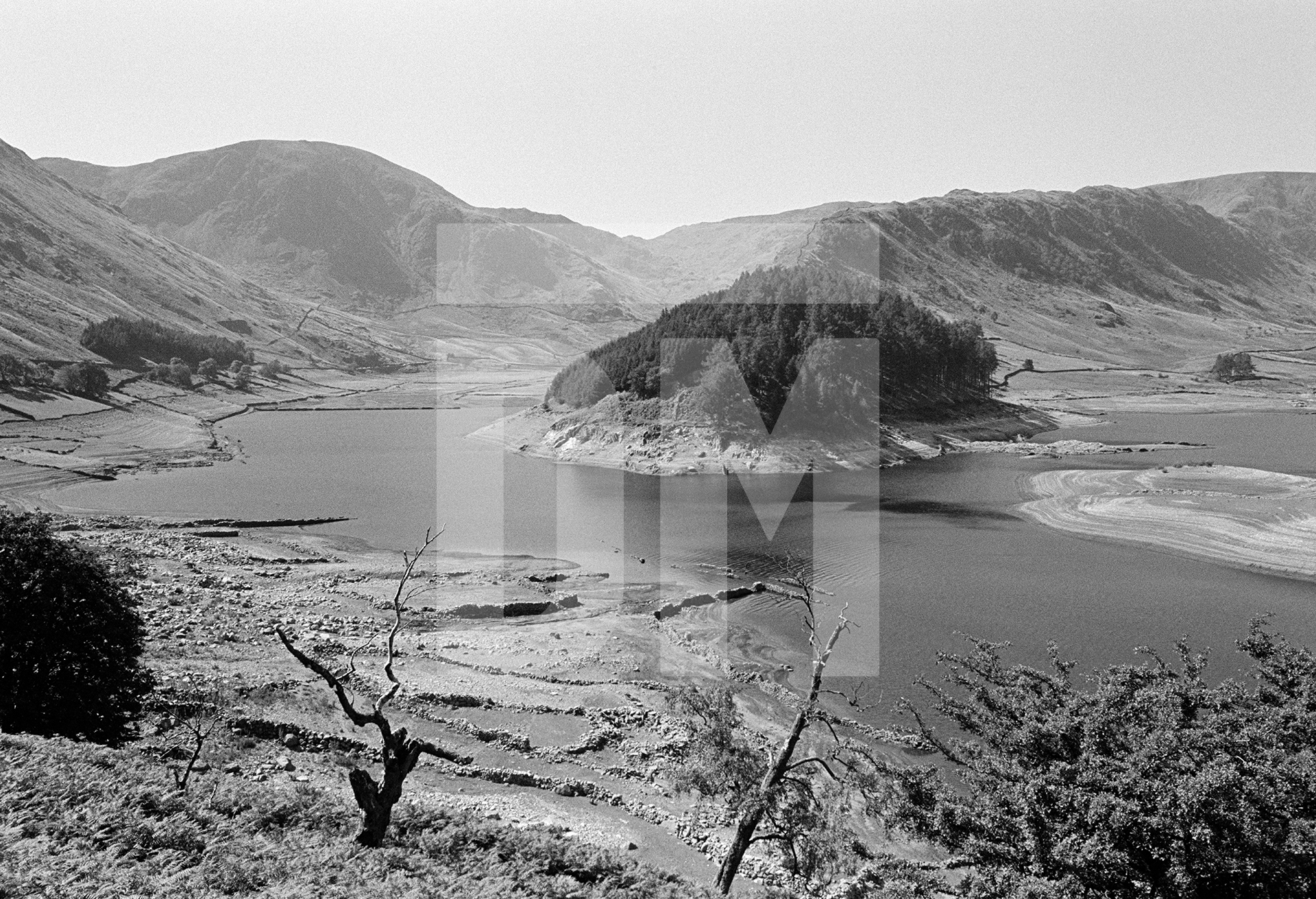 Drought of a dry summer, old village of Mardale revealed in Haweswater. Cumbria, Lake District. August 1976 by Daniel Meadows