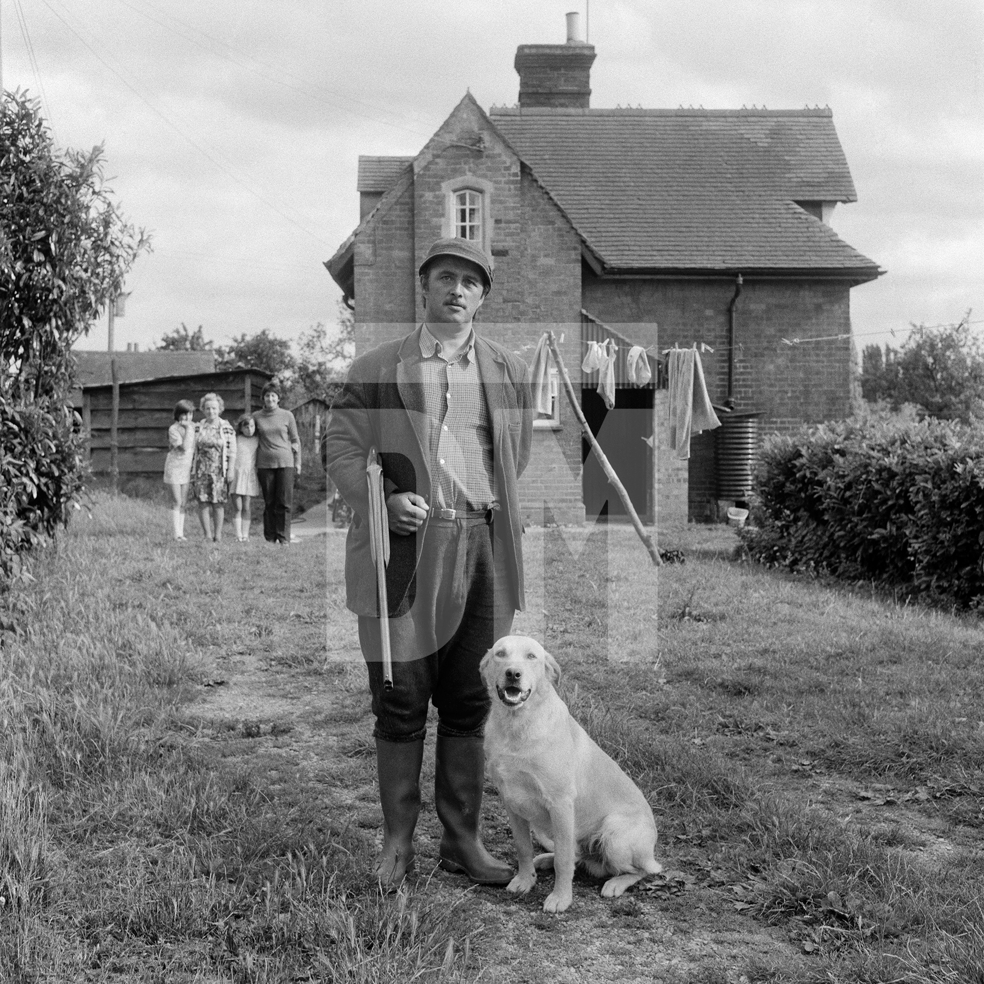 Mike Fitzer, under-keeper, and family, Great Washbourne, Gloucestershire. July 1974 by Daniel Meadows