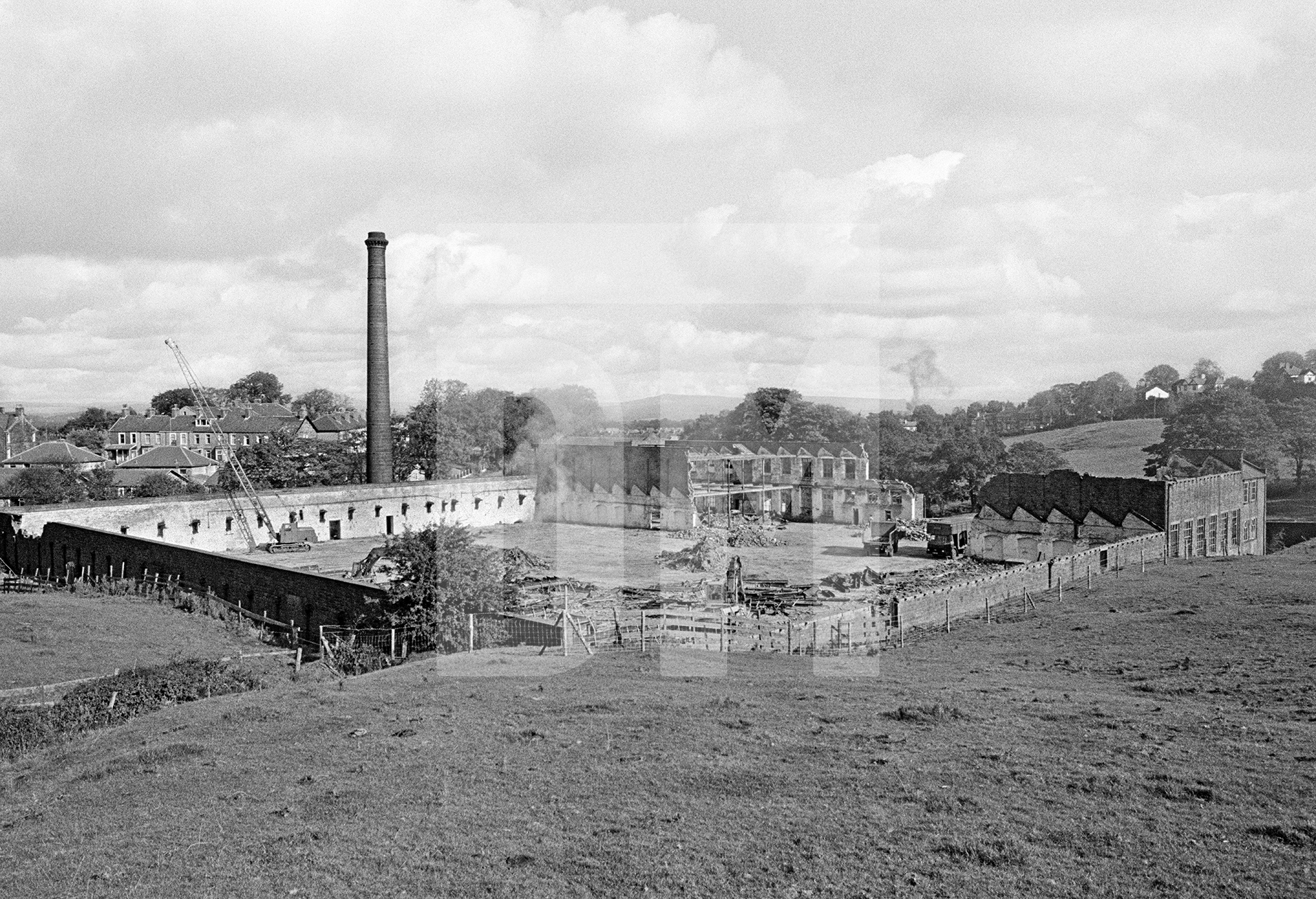 View from the southwest during demolition of the weaving shed and warehouse. October 1980 by Daniel Meadows