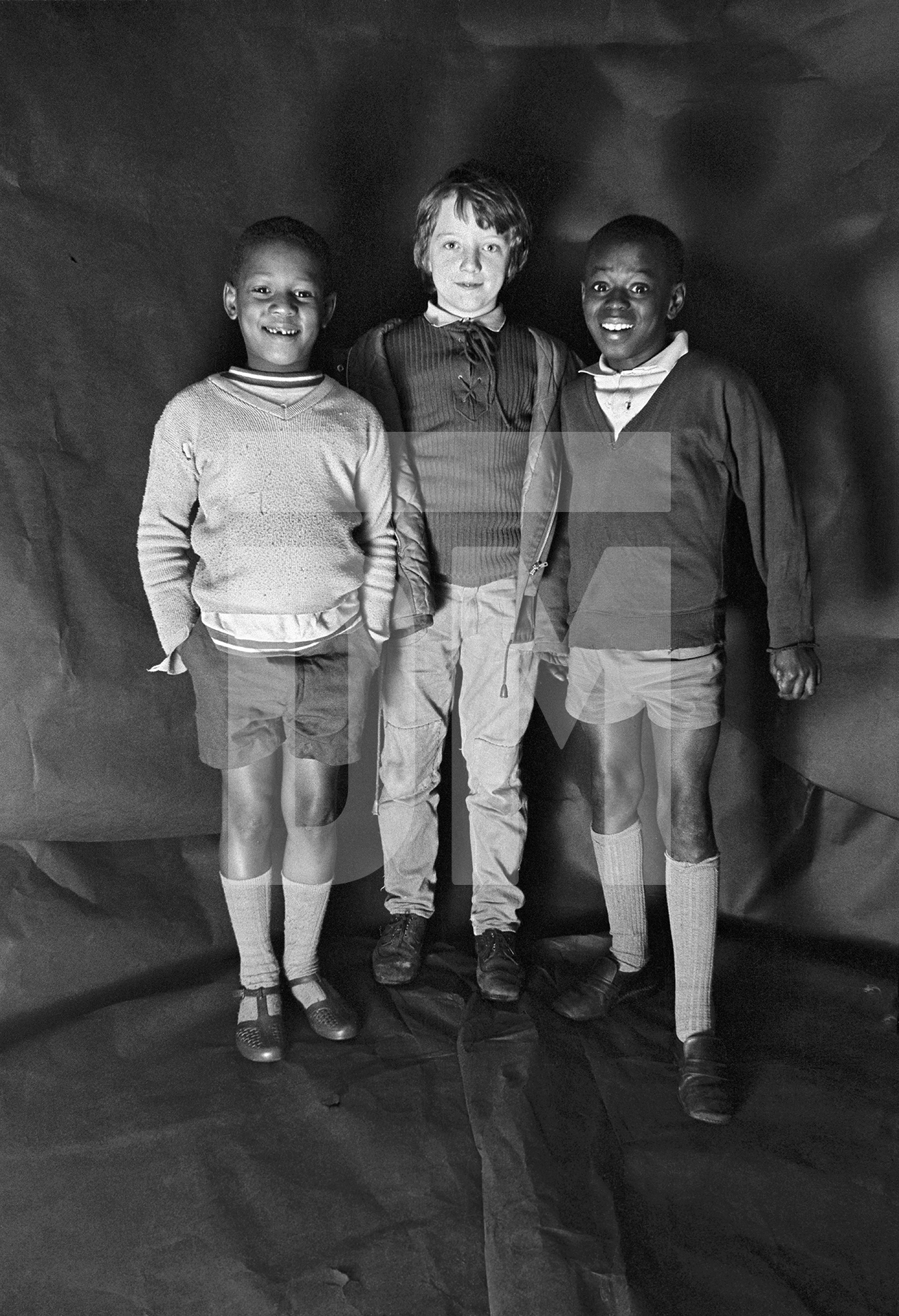 Group portrait from The Shop on Greame Street, Moss Side, Manchester. February-April 1972 by Daniel Meadows