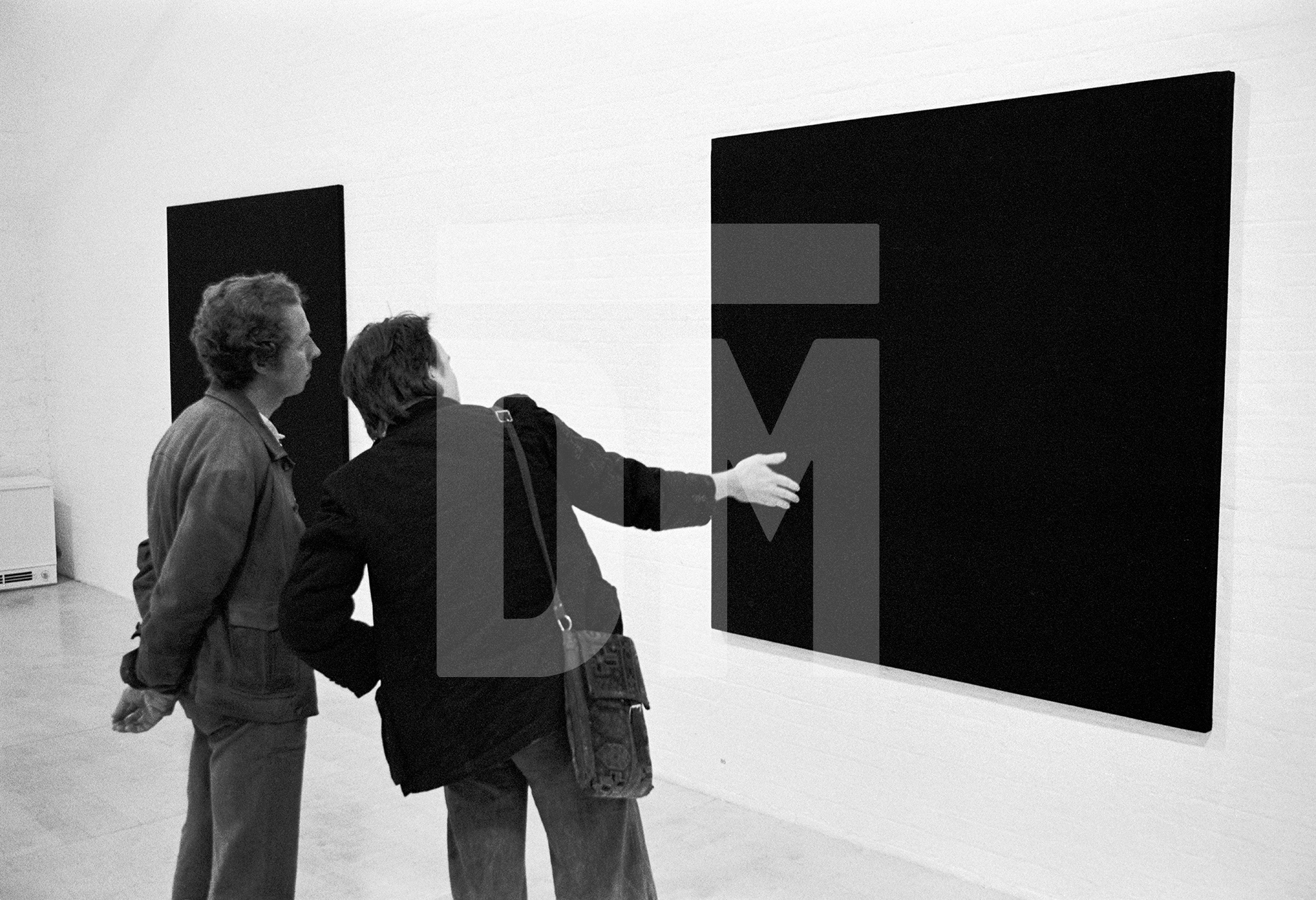Exhibition opening of work by artist Bob Law, Museum of Modern Art, Oxford. May 1974 by Daniel Meadows