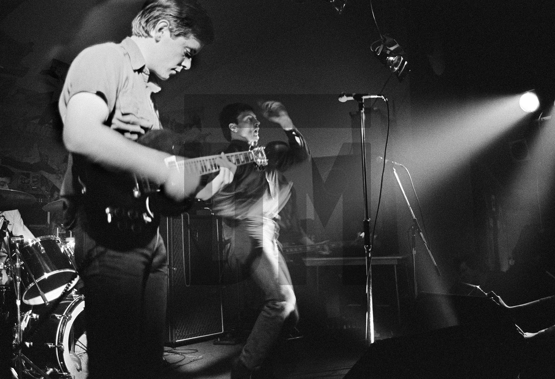 Joy Division on stage at New Osbourne Club, Miles Platting, Manchester. 7 February 1980 by Daniel Meadows