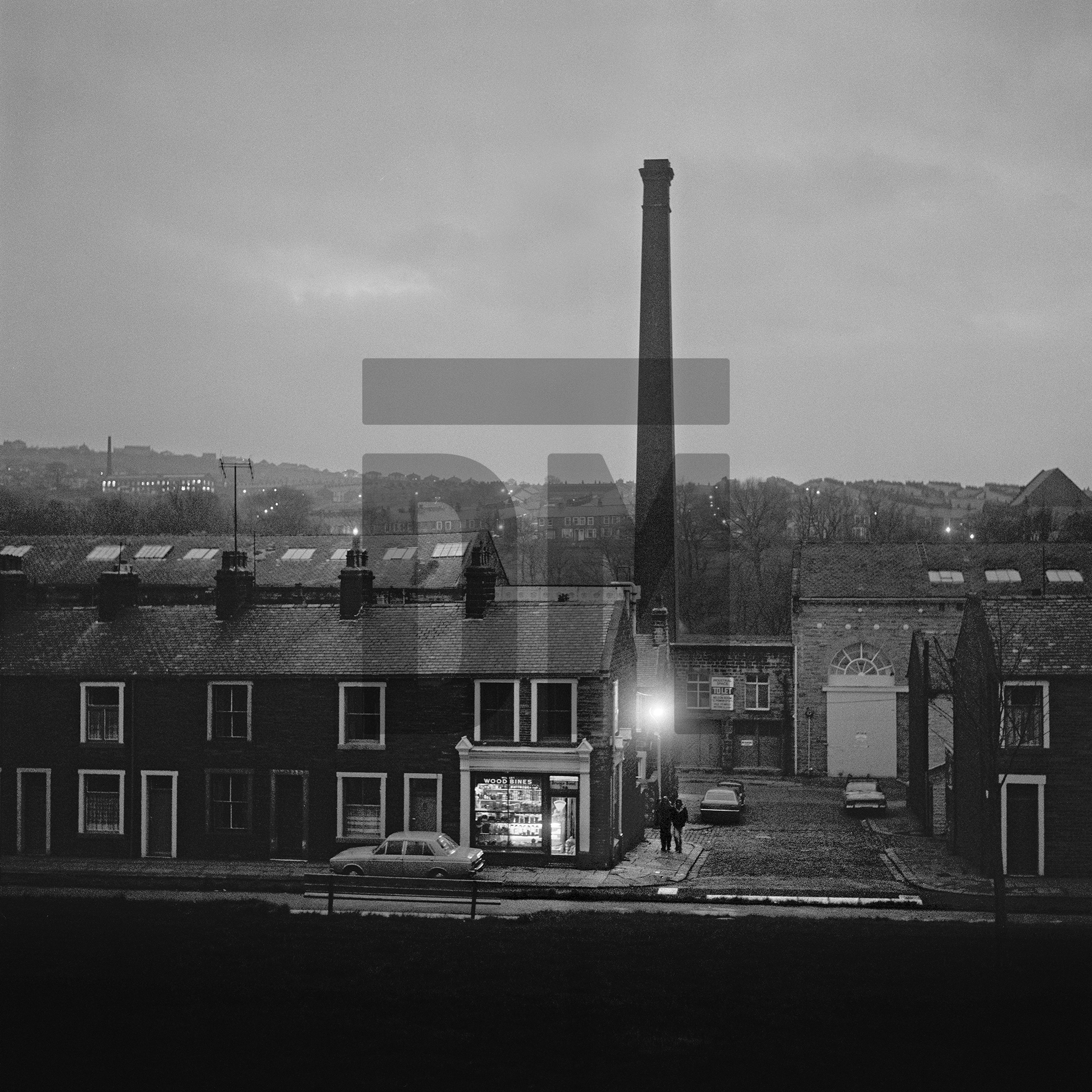 Corner shop, evening, Nelson, Lancashire. November 1975 by Daniel Meadows