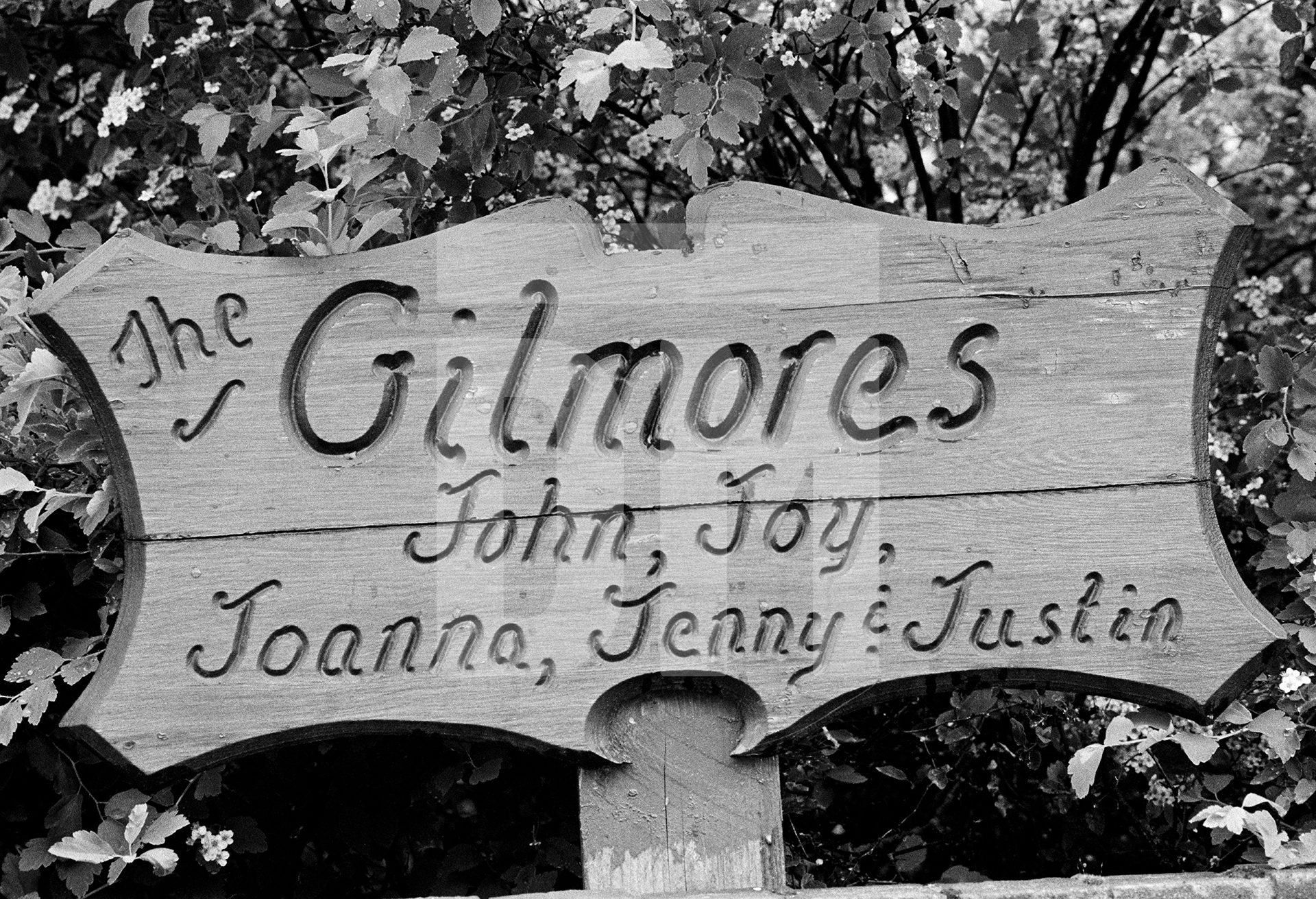 House sign, Beaconsfield, Berkshire. June 1985 by Daniel Meadows