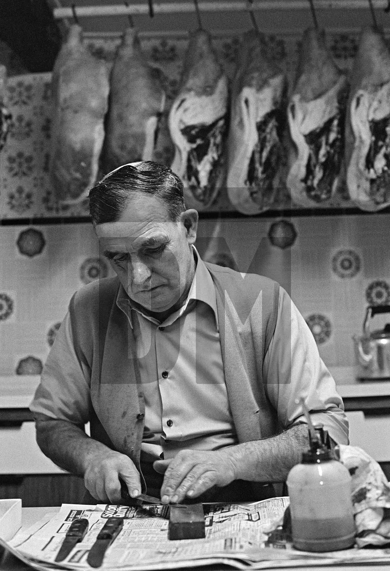 Cyril Richardson sharpening knives. North Yorkshire 1976 by Daniel Meadows