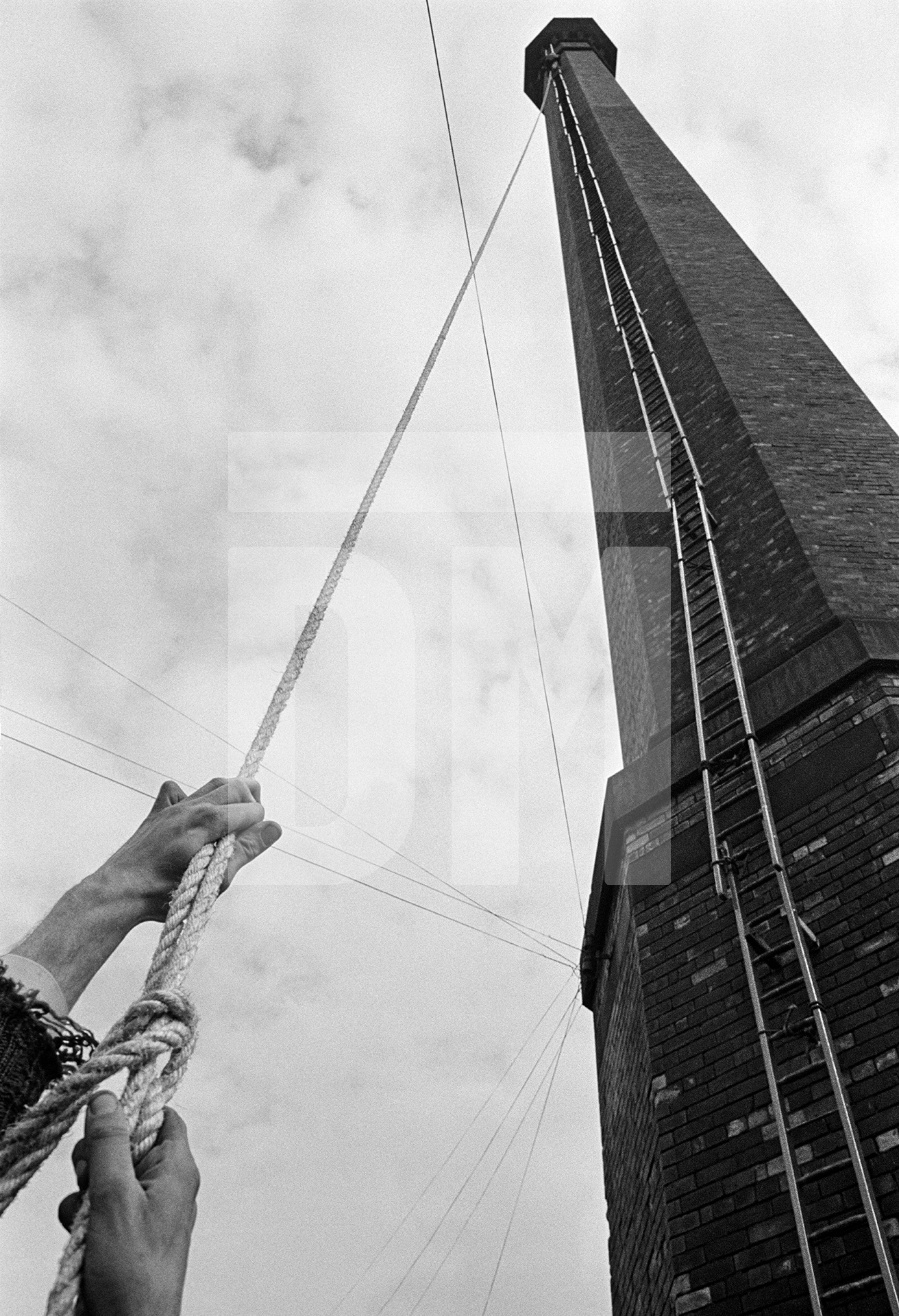 Laddering almost complete, as seen from the point-of-view of the steeplejack’s assistant. September 1976 by Daniel Meadows