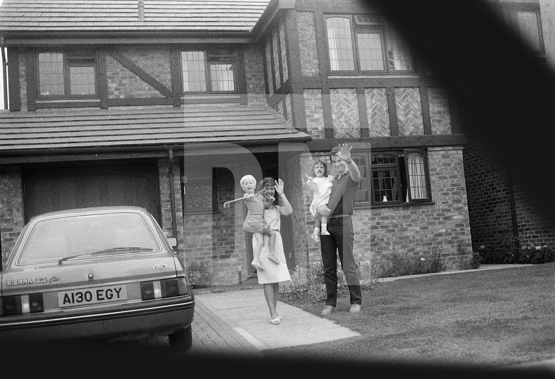 Waving bye-bye, Shortlands, Kent. April 1985 by Daniel Meadows