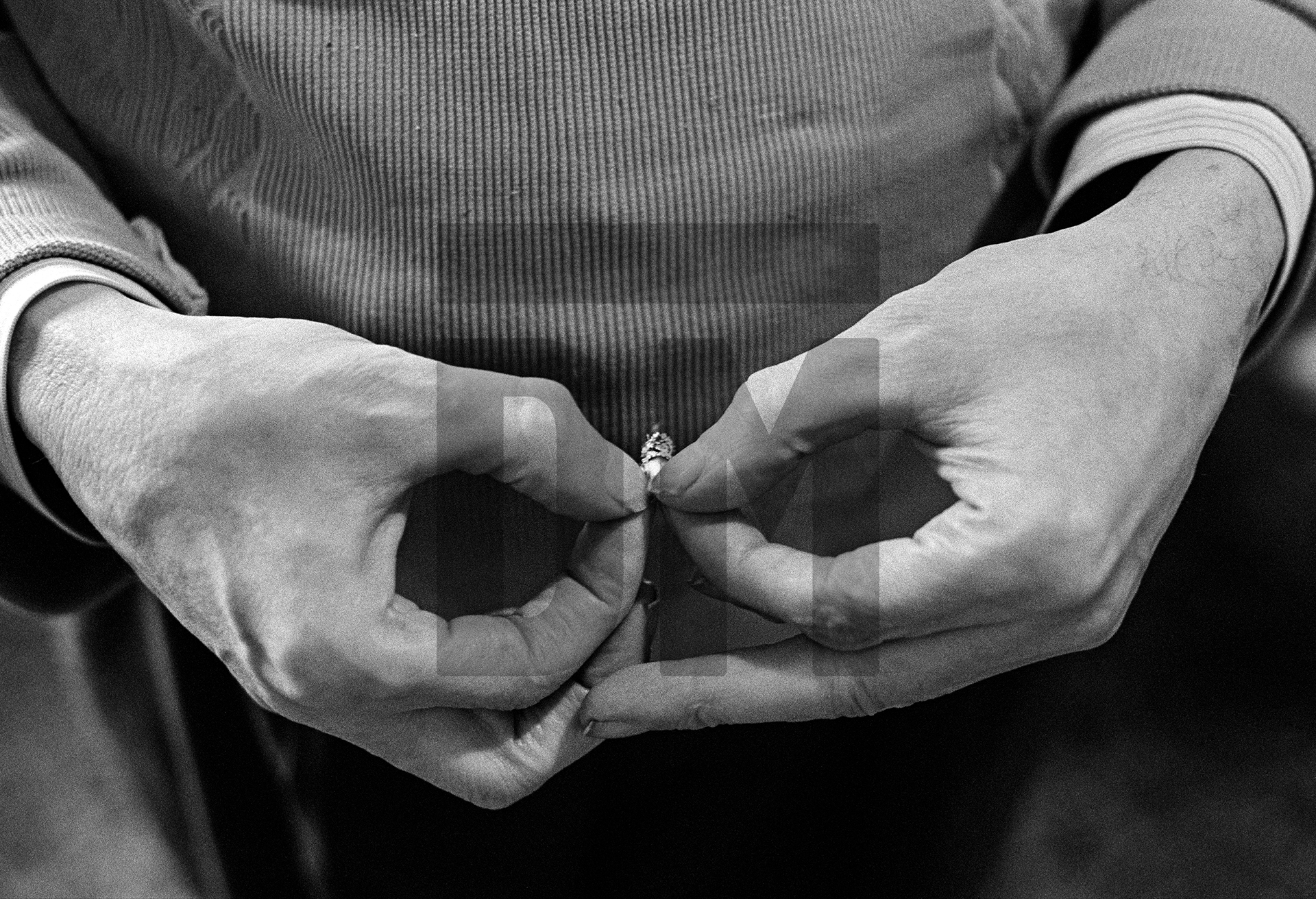 A patient holds a tab-end or ‘dimp’. An addiction to smoking is a necessary pre-requisite for being admitted to the programme. February 1978 by Daniel Meadows