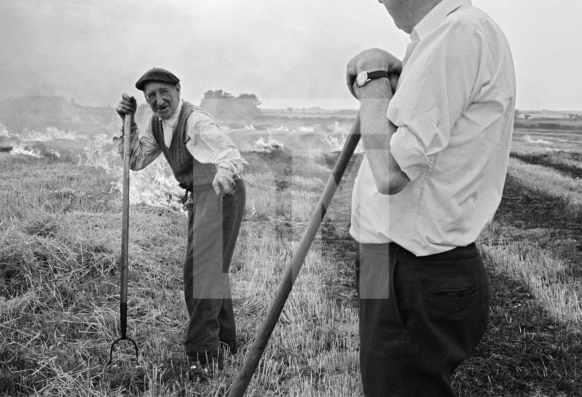 Stubble burning, Norfolk. August 1974 by Daniel Meadows