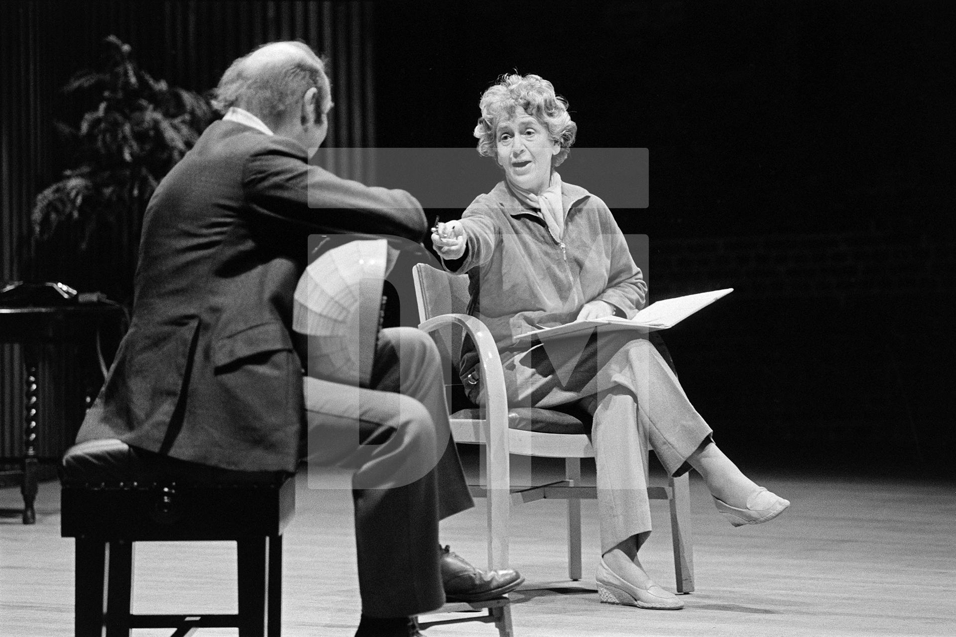 Julian Bream on stage with Dame Peggy Ashcroft, Snape Maltings Concert Hall, Suffolk. June 1981 by Daniel Meadows