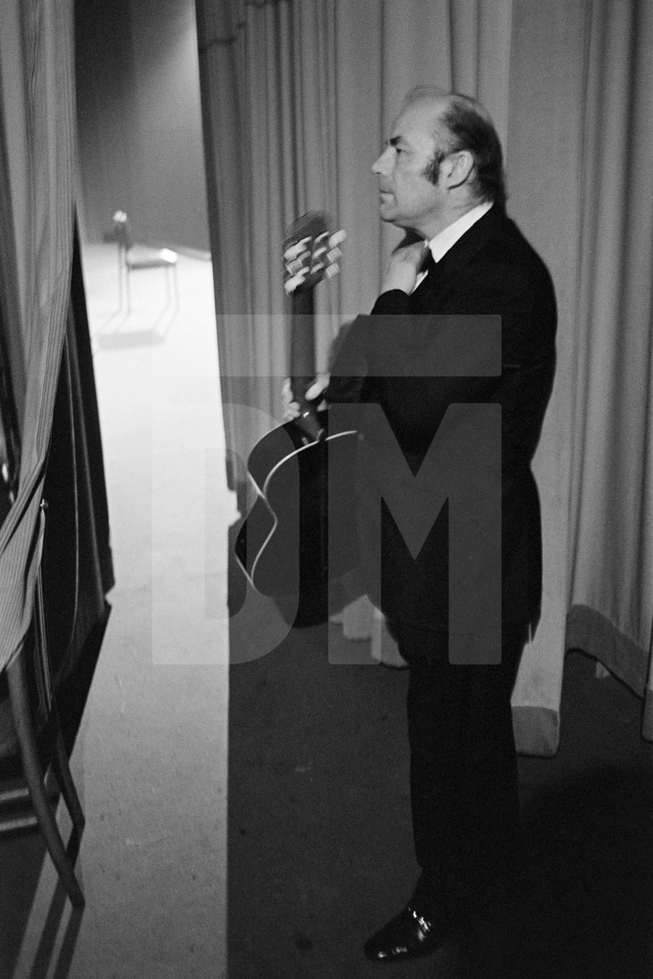 Julian Bream, about to go on stage, Rome. 17 March 1981 by Daniel Meadows