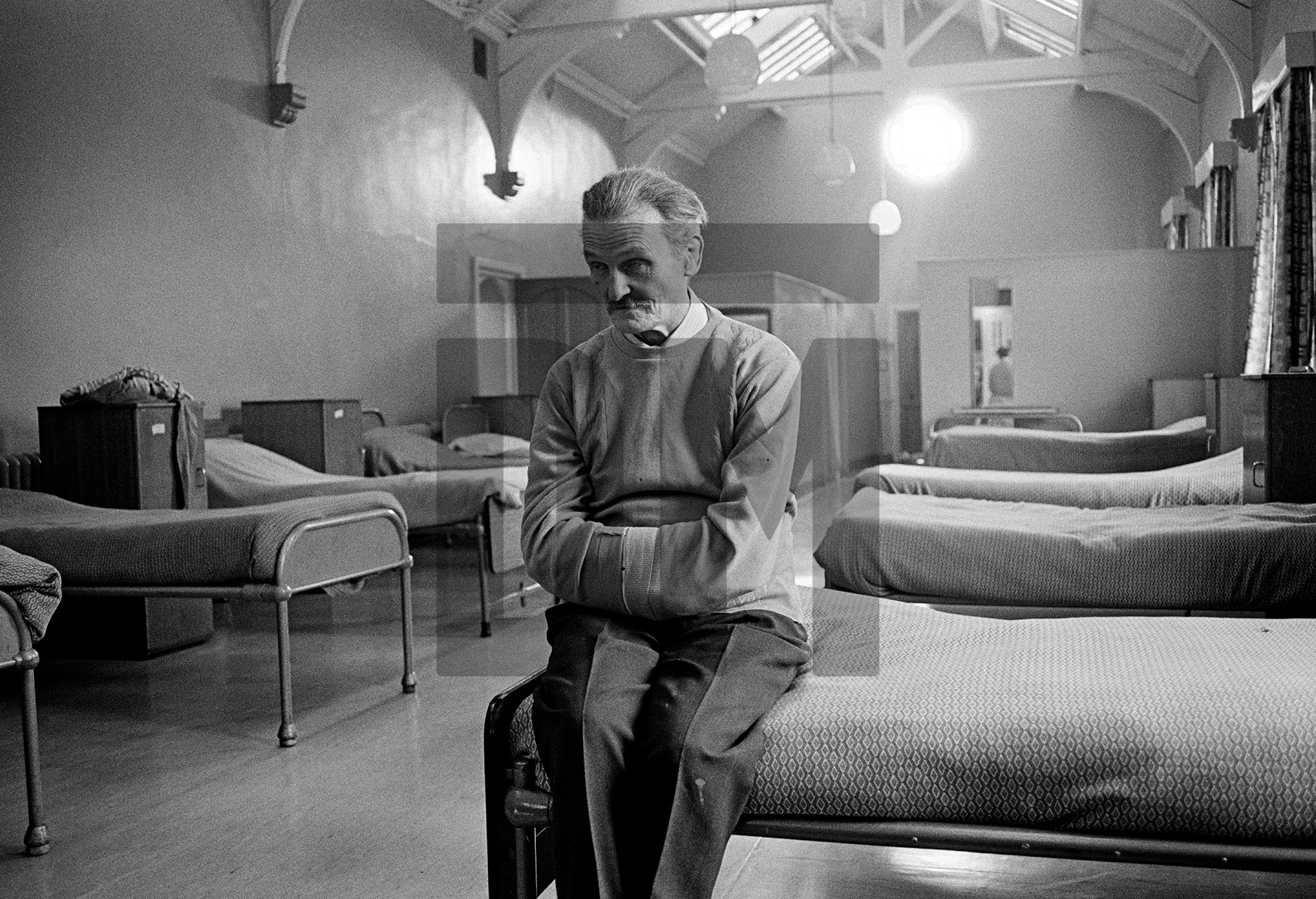 John Keeley, aged 63, formerly an unholsterer, is described as being ‘catatonic’. He stands or sits motionless for hours in one position. February 1978 by Daniel Meadows