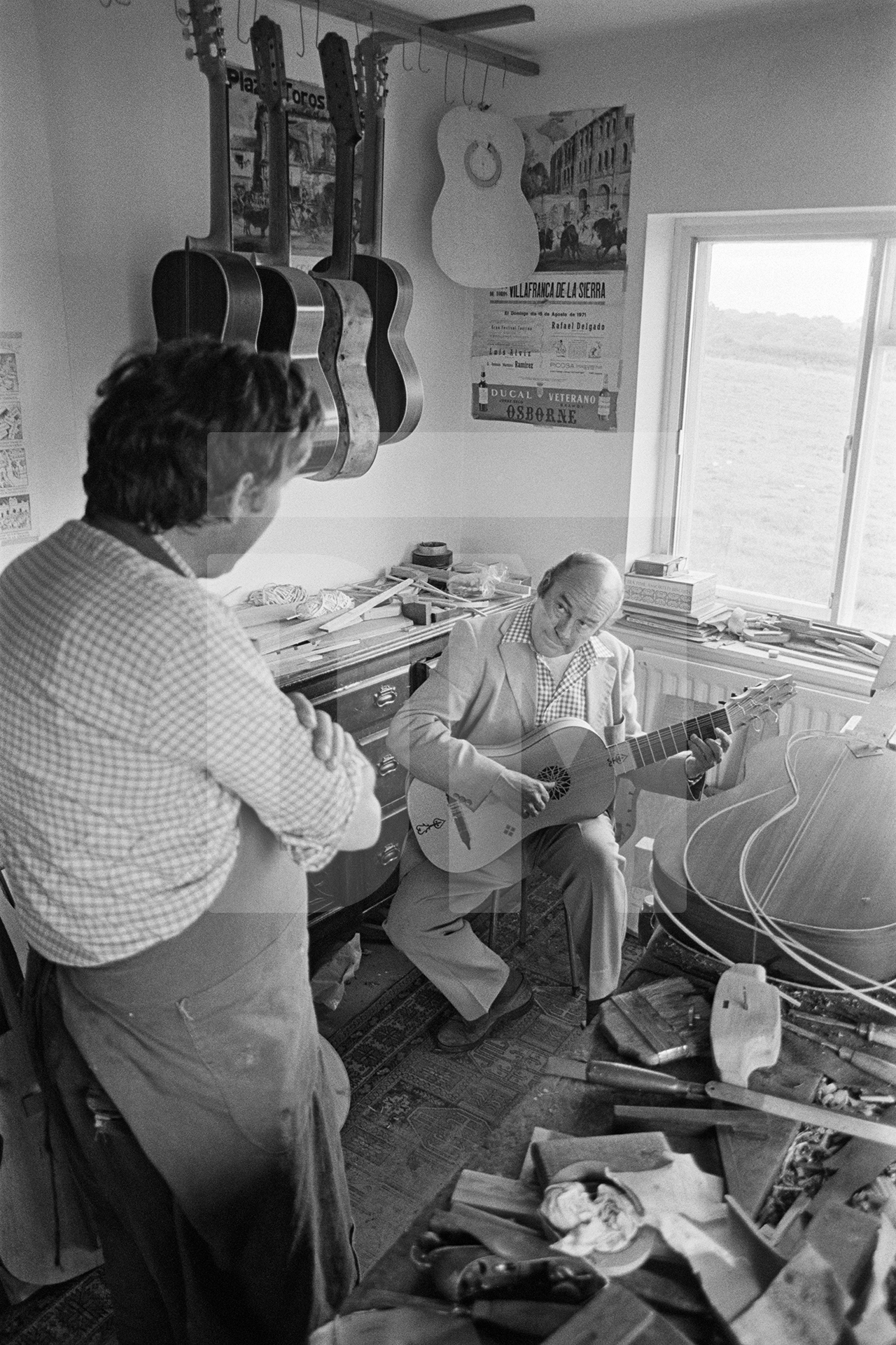 Julian Bream with vihuella in the guitar workshop of José Romanillos, Wiltshire. August 1981 by Daniel Meadows