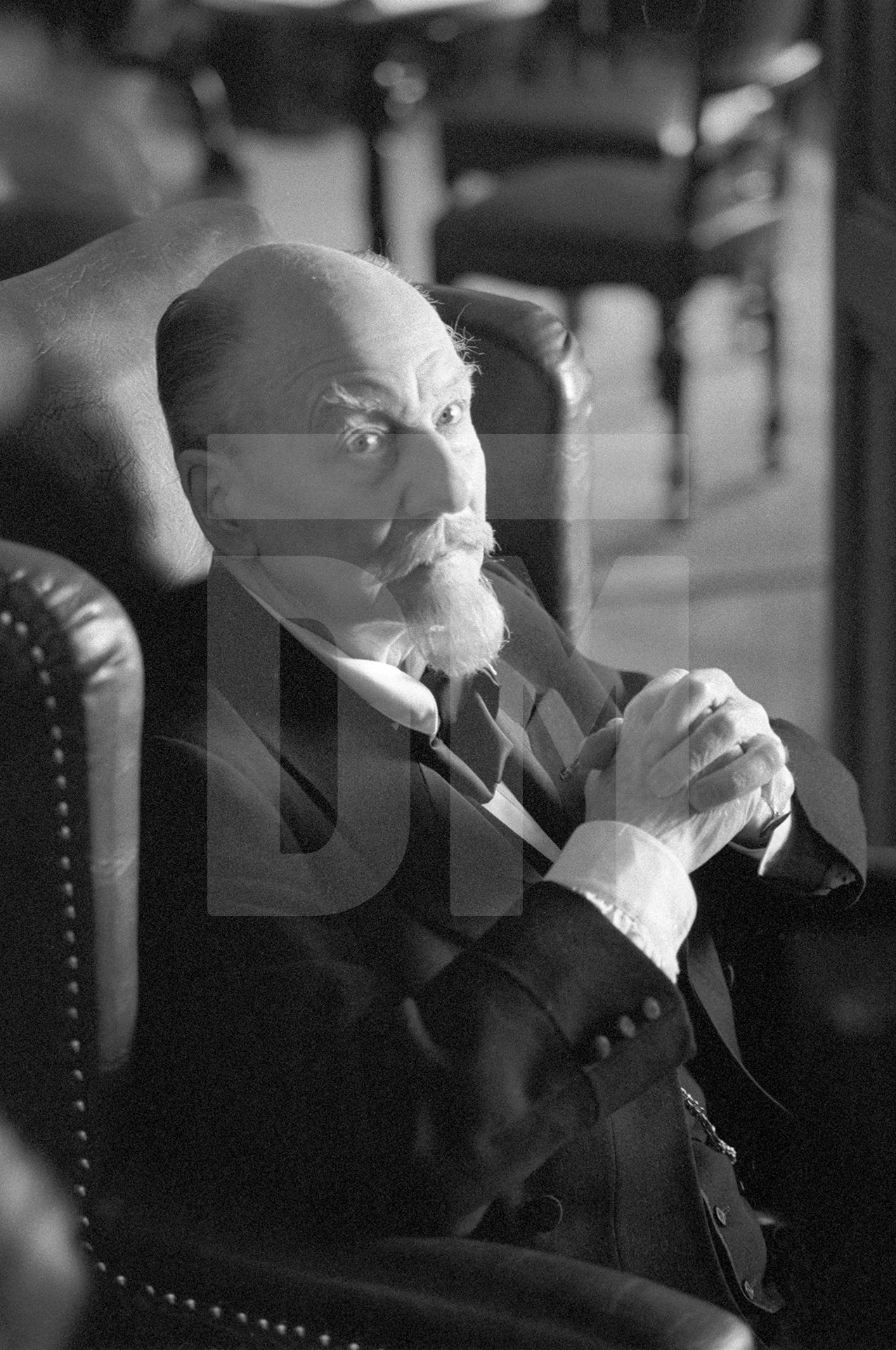 Sir John Gielgud [Pfistermeister] on the set of 'Wagner'. Vienna 1982 by Daniel Meadows