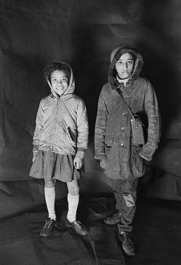 Angela Loretta Lindsey, aged 8, with her brother Mark Emanuel Lindsey. Portrait from The Shop on Greame Street, Moss Side, Manchester. February-April 1972
