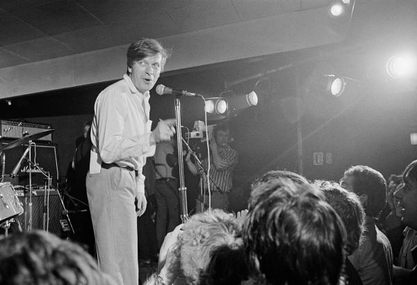 Tony Wilson at the Russell Club for a ‘Factory’ night. ‘What's On’ from Granada TV on location, Hulme, Manchester. April 1979