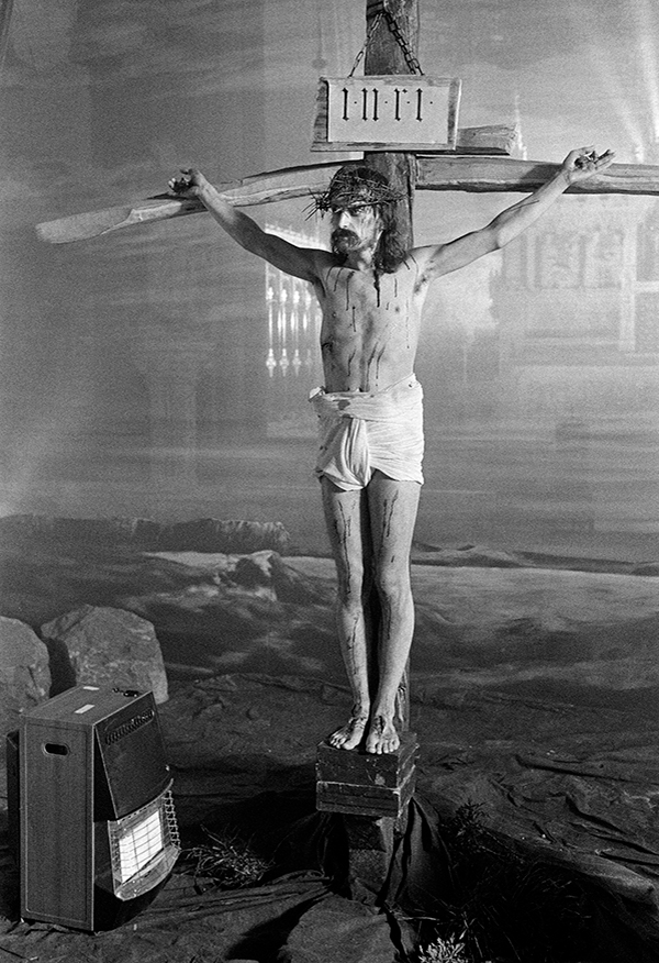 Paul Waggett [Christ] from Southport, a social security appeals tribunal clerk, in the Crucifixion scene, on the set at St Francis Xavier church, Everton. Tony Palmer’s ‘Hindemith’ for LWT’s South Bank Show, March 1989