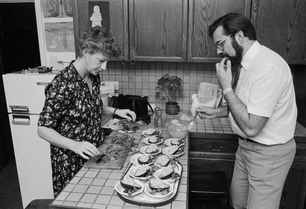 Preparing avocado with prawn cocktail, Beckenham, Kent. February 1985