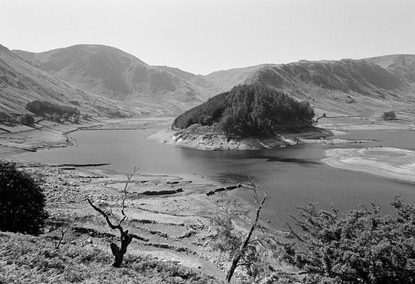 Drought of a dry summer, old village of Mardale revealed in Haweswater. Cumbria, Lake District. August 1976