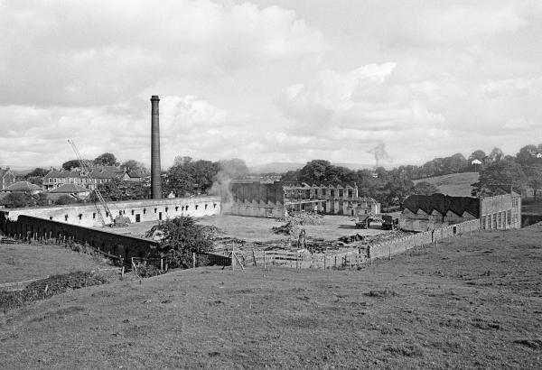 View from the southwest during demolition of the weaving shed and warehouse. October 1980