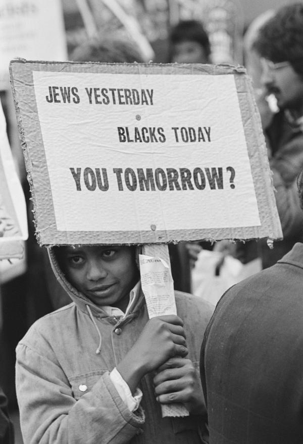 Anti National Front demonstrator attends a demonstation, Blackburn, Lancashire. September 1976