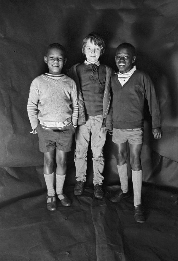 Group portrait from The Shop on Greame Street, Moss Side, Manchester. February-April 1972