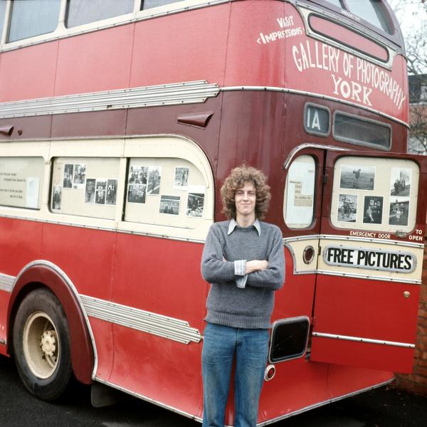 In late 1973, Andrew Sproxton of Impressions Gallery in York visited Daniel and, using a pair of scissors, cut freehand from a roll of stickyback plastic, a tailor-made advertisement which he applied to the rear upper exterior of the Free Photographic Omnibus.