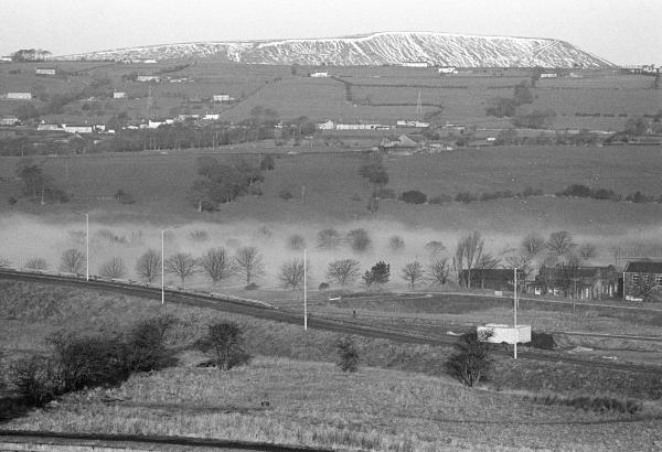 In snow with mist, Pendle Hill, Lancashire. February 1981