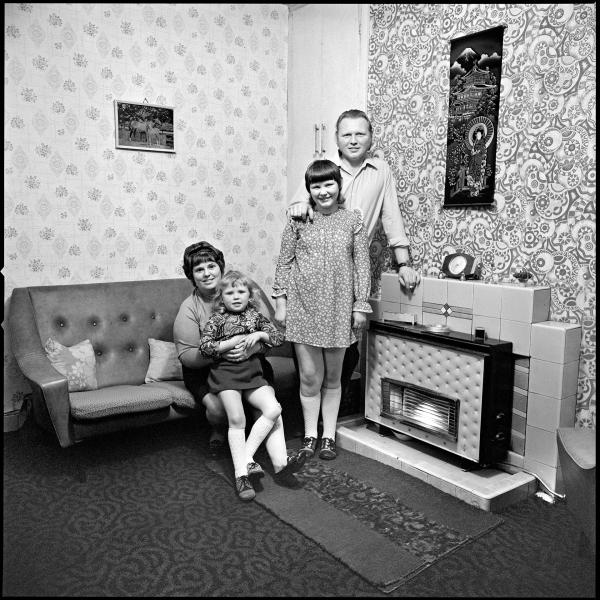 Mary and John Rowlands and daughters Sandra (standing) and Gillian. (Identified as her relations in 2011 by Debbie Fielding, publications administrator at Cornerhouse.) Residents of June Street, Salford. 1973