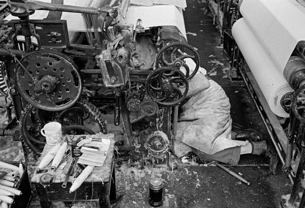 In the weaving shed. Loom sweeper. May 1976