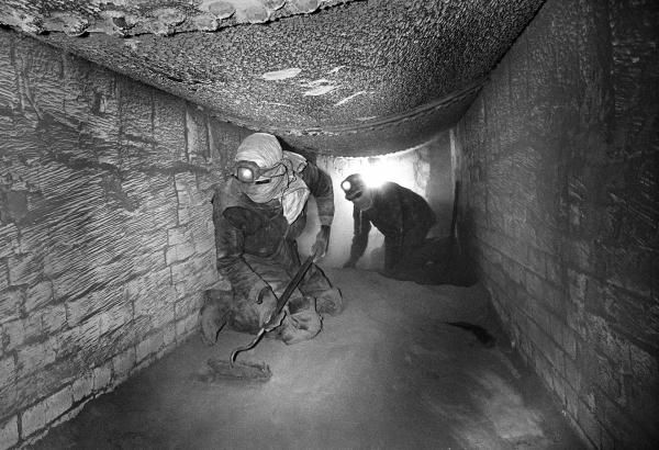 Working in the sole flue beneath the Lancashire boiler, raking fluedust. Easter holiday, April 1976