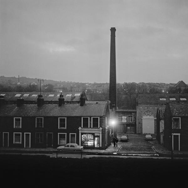 Corner shop, evening, Nelson, Lancashire. November 1975