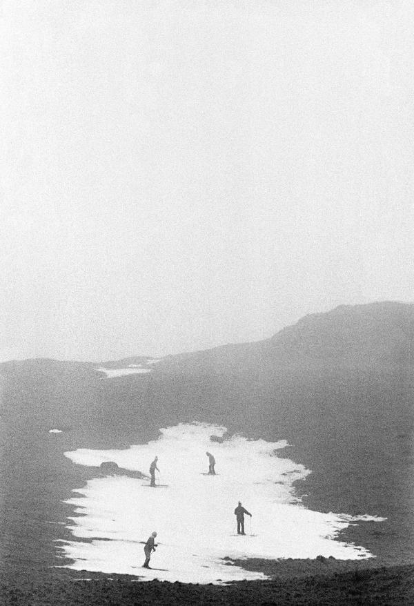 Skiing on remnants of snow during a thaw, Shap fell, Cumbria. January 1977