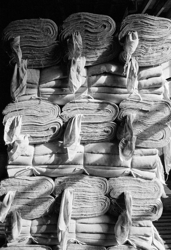 In the warehouse. Loom-state (‘grey’) cloth awaiting collection. April 1976
