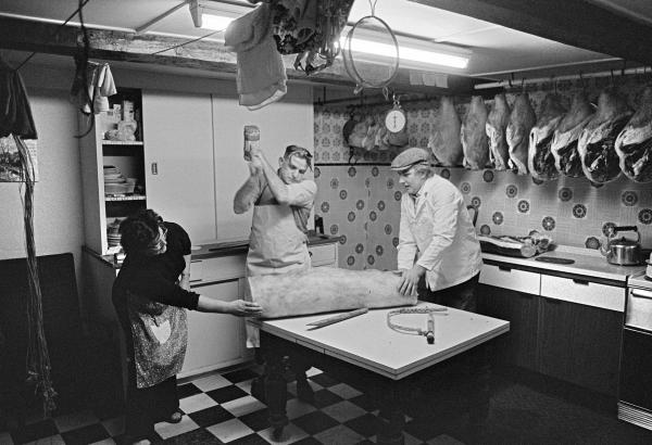 Bacon rolling. Cyril Richardson wields the mallet. North Yorkshire 1976