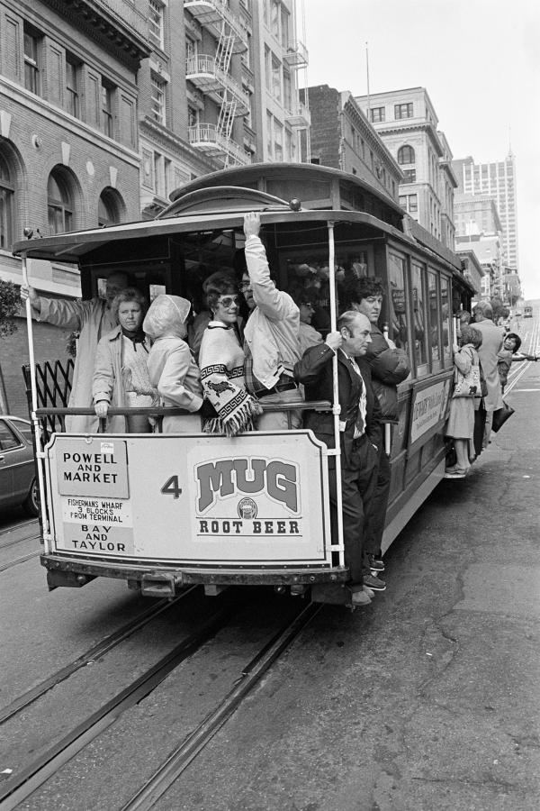 Julian Bream aboard a cable car, San Francisco. November 1981