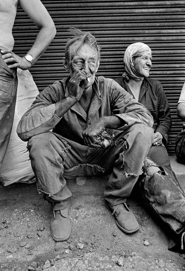 Charlie Sutton, boss of the Weldone gang from Brierfield taking a break duing fluing. Wakes holiday, July 1976