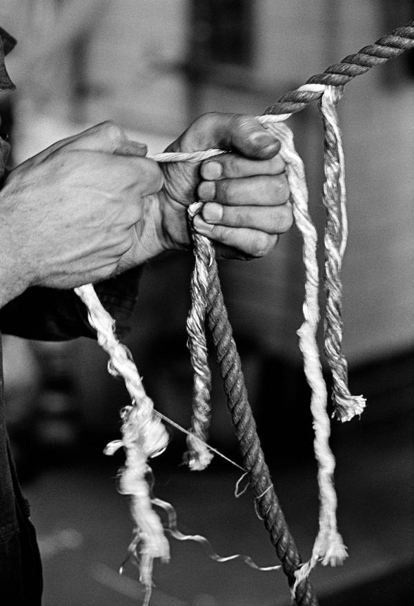 In the engine house. Wakes holiday maintenance. Knotting and splicing governor ropes. July 1976