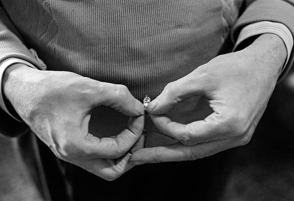 A patient holds a tab-end or ‘dimp’. An addiction to smoking is a necessary pre-requisite for being admitted to the programme. February 1978