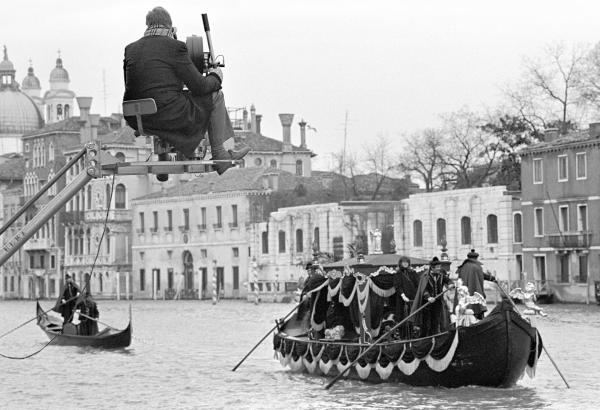 Tony Palmer [director] on a camera crane for his film 'Wagner'. Venice 1982