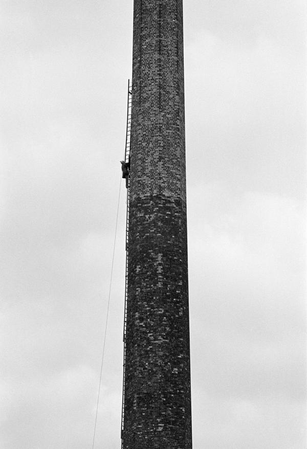 Laddering prior to demolition. Half way up. September 1976