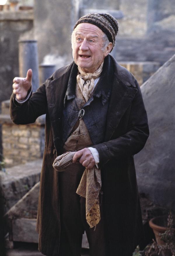 Cyril Cusack [Ballad Seller] in ‘The Fool’. Sands Films, Rotherhithe. London, 1990