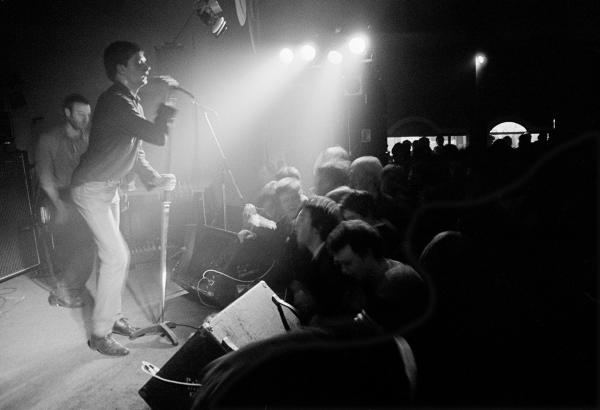 Joy Division on stage at New Osbourne Club, Miles Platting, Manchester. 7 February 1980