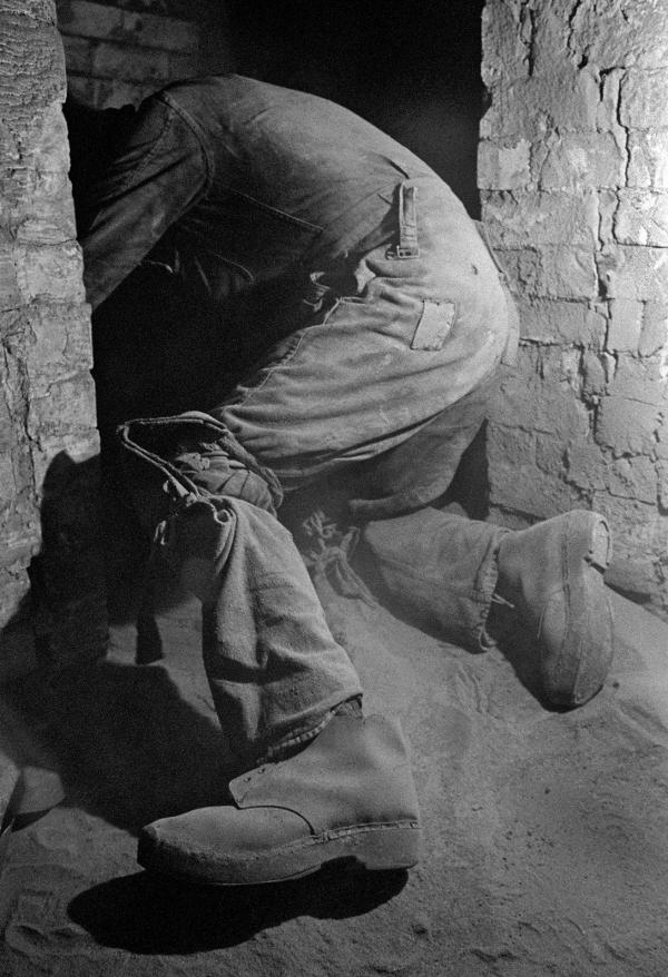 Entering the side flue from the sole flue, beneath the Lancashire boiler, while shovelling fluedust. Easter holiday, April 1976