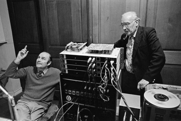 Julian Bream, with engineer John Bower, during recording session, Wardour Chapel, Tisbury, Wiltshire. October 1981